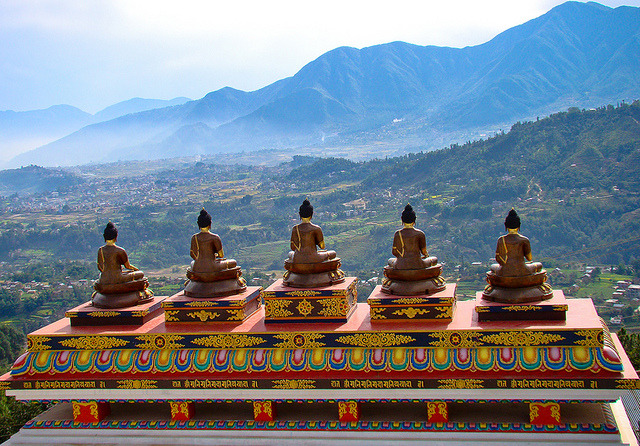 by Tilak Thapa on Flickr.Five Buddhas on the top of Amitabh Monastery in Nepal.