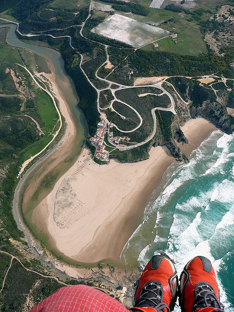 Paraglider view above Praia de Odeceixe, Algarve Coast, Portugal