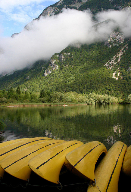 Yellow canoes on the shores of Lake Bohinj, Slovenia
